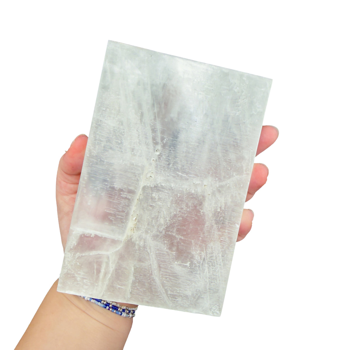 AAA grade selenite clearing block from New Mexico, detail of the fibrous surface, translucent white gypsum fiber, specimen 69.