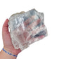 Selenite clearing slab from New Mexico held in an open hand, backlit to show translucency, 0.84 pound piece, specimen 54.