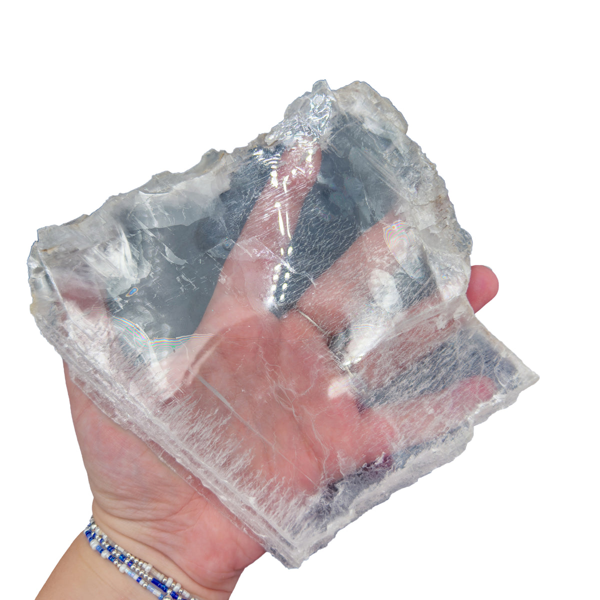 AAA grade selenite clearing slab from New Mexico, detail of the fibrous surface, translucent white gypsum fiber, specimen 59.