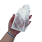 Selenite standing slab from New Mexico held in an open hand, showing the true scale of this 1.09 pound piece, specimen 70.