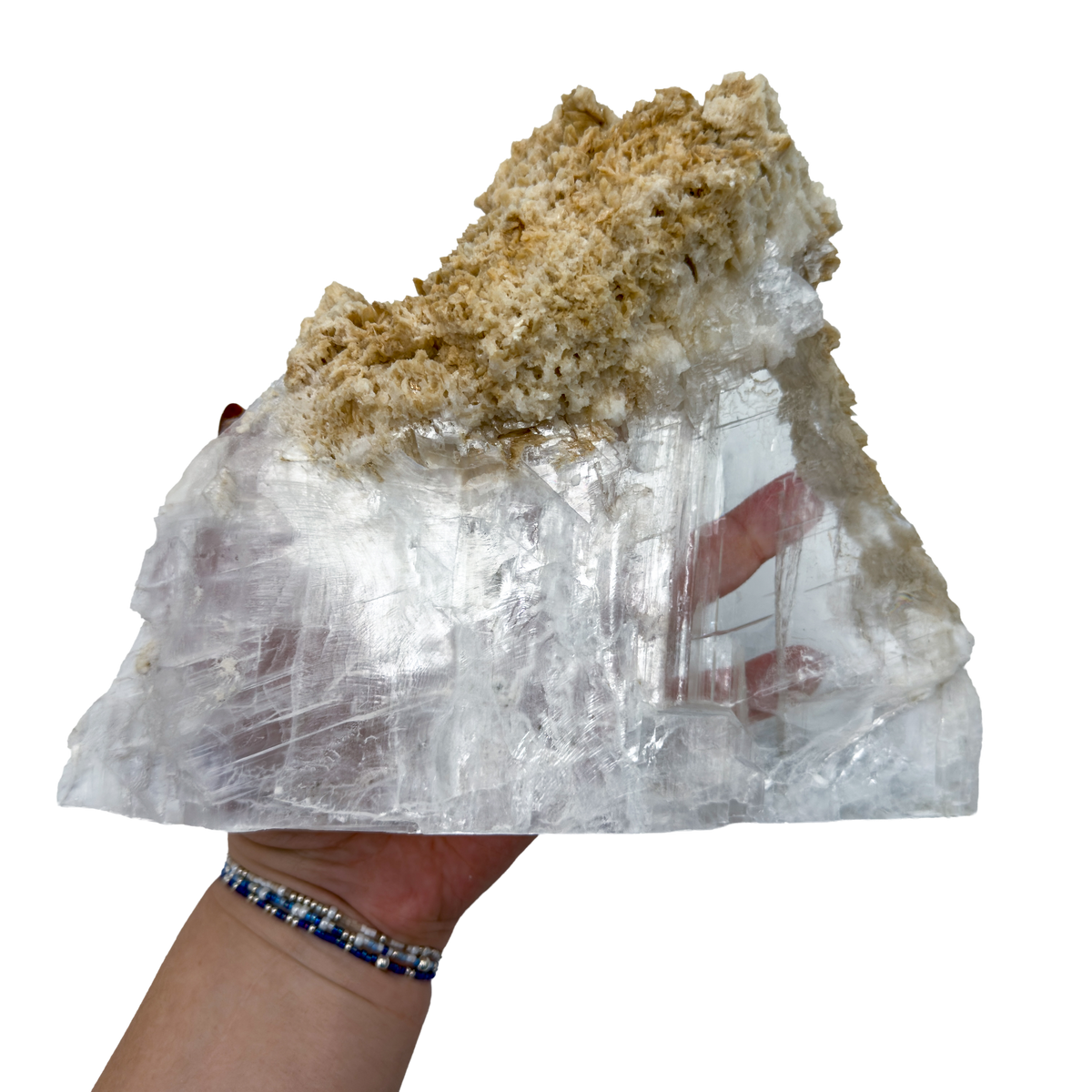 Selenite standing slab from New Mexico held in an open hand, showing the true scale of this 2.77 pound piece, specimen 78.