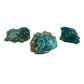 Assortment of raw Shattuckite and Chrysocolla pieces, each showing a different balance of turquoise, teal, and rust-toned host matrix.