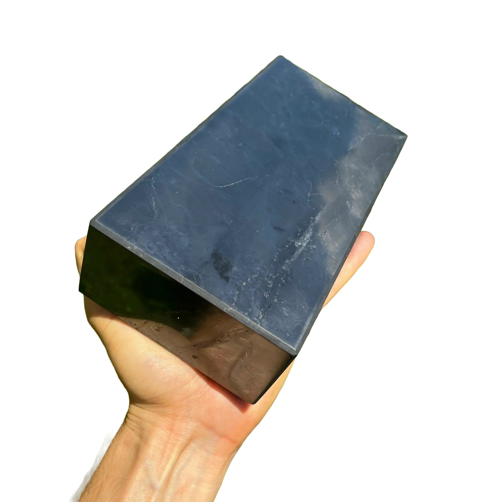 Back view of Grade Type III - Regular Grade Shungite polished crystals & decor showing natural surface