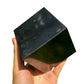Grain detail of Shungite polished cube, traditionally used for Protection, from Republic of Karélia, Russia.