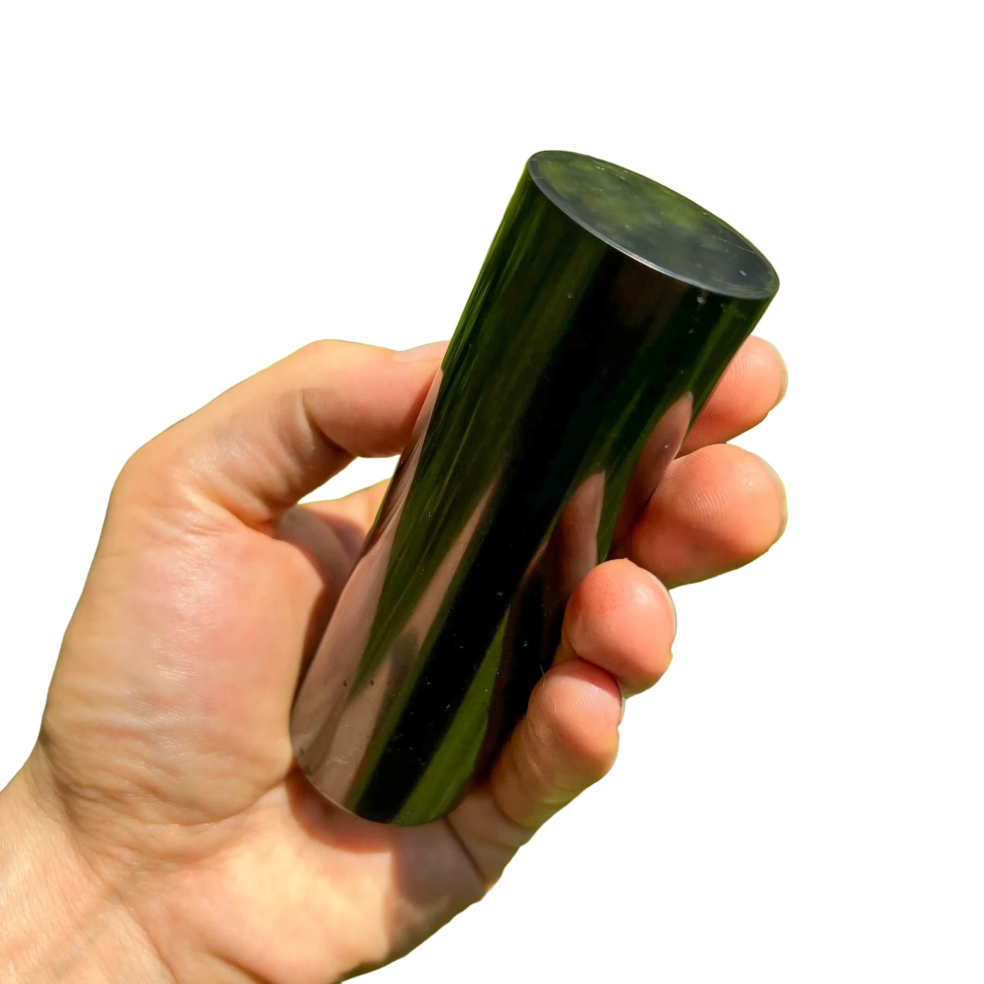 Size comparison with a single Shungite polished cylinder sourced from Russia.