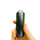 Sideways view of Shungite polished point, associated with Protection and Cleansing, hand-selected from Republic of Karélia, Russia.
