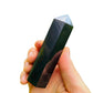 Aerial view of Shungite polished point, showing natural inclusions, worked with for Protection and Cleansing.