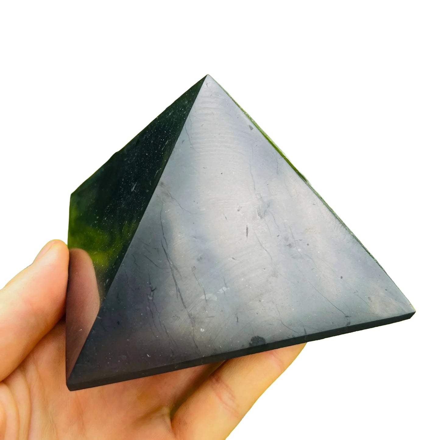 Profile shot of Shungite polished pyramid, carried for Protection.