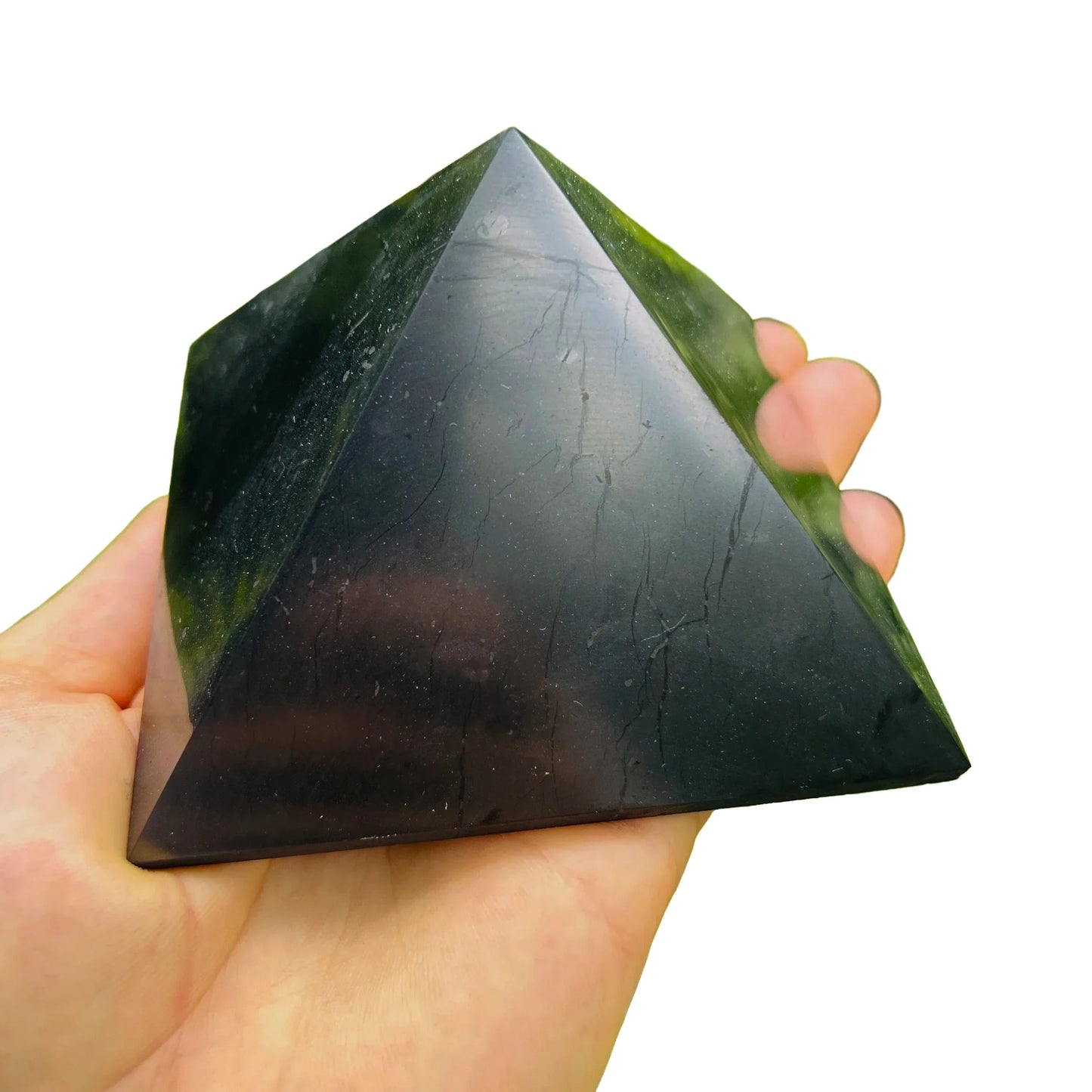 Back view of Shungite polished pyramid, showing glassy finish.