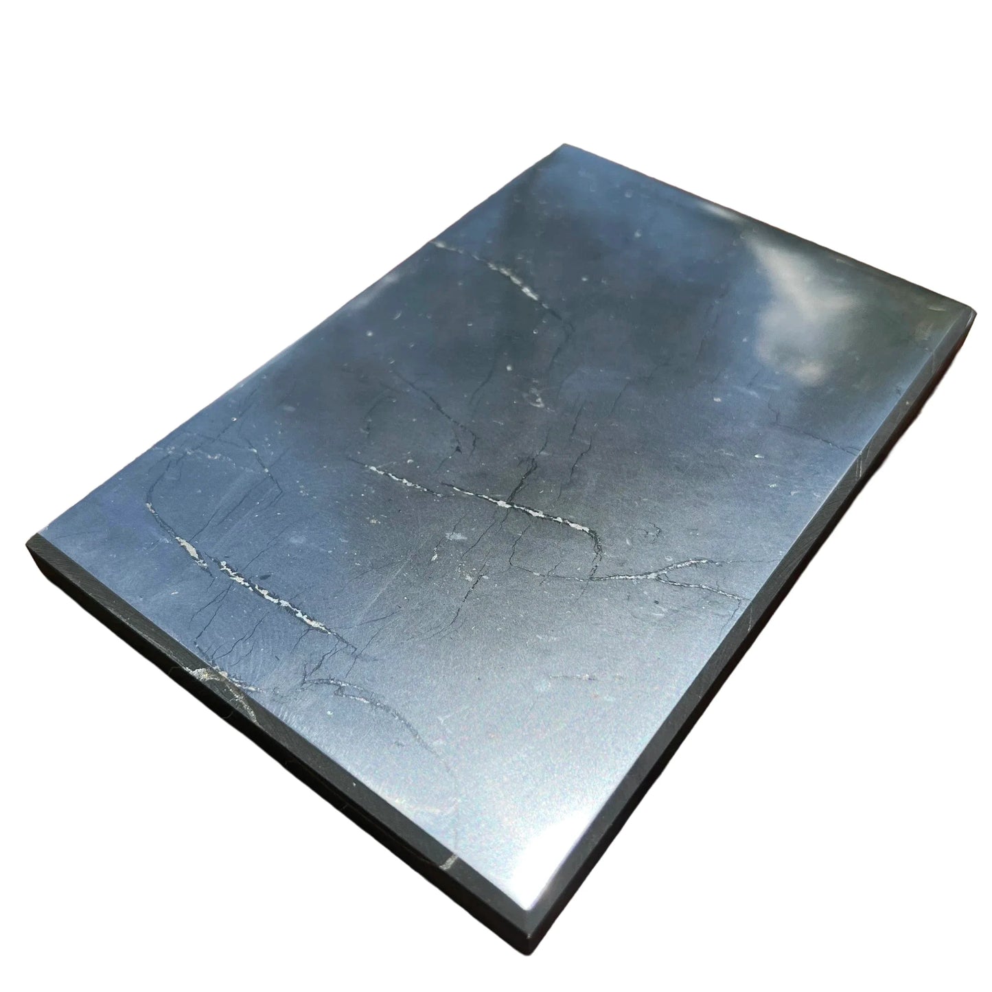 Top angle of Shungite polished slab, showing earthy tone, to support Protection.