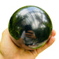 Top view of Shungite polished sphere, associated with Protection, from Republic of Karélia, Russia.
