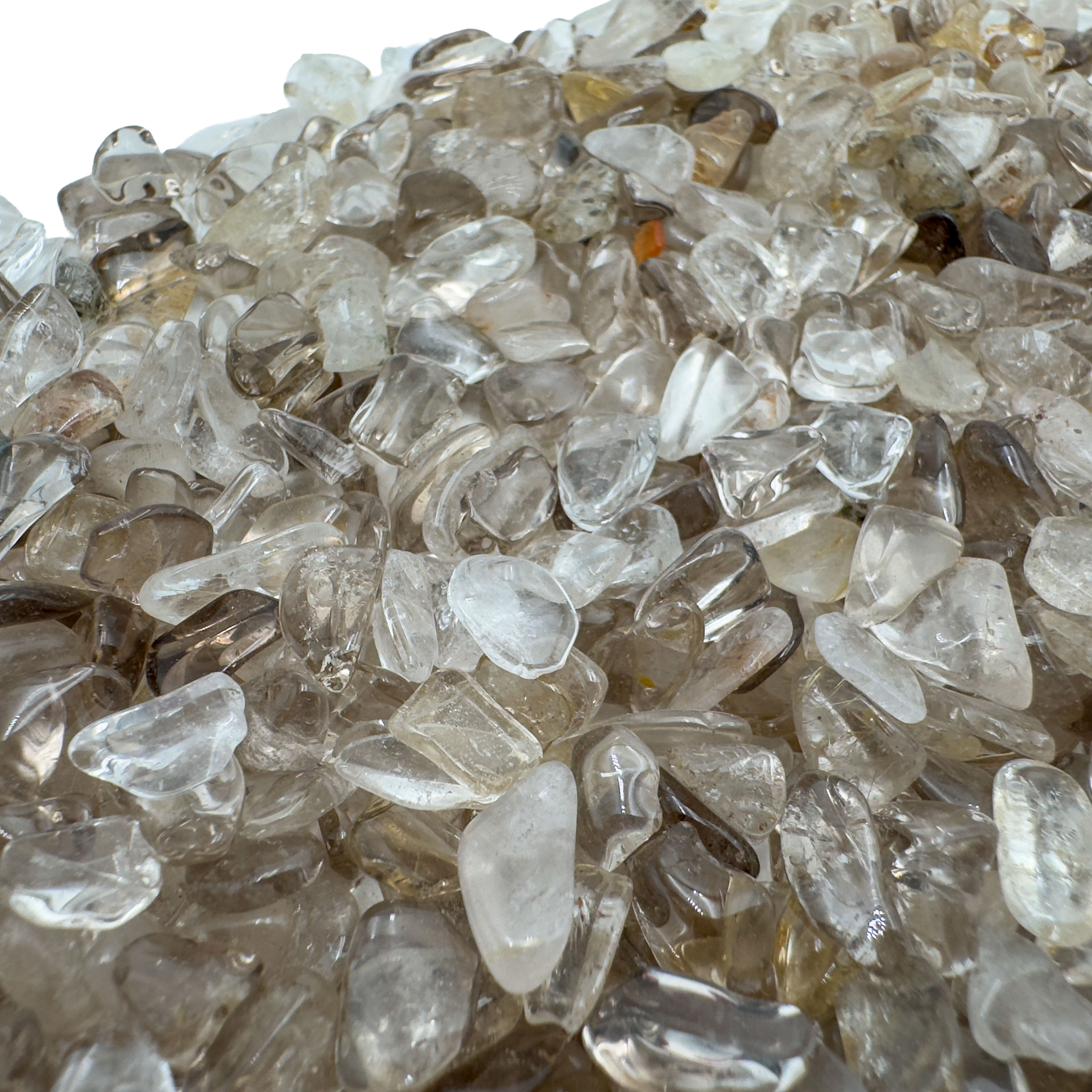 Held in hand, a single Smoky Quartz polished chip from Mashonaland East, Zimbabwe.