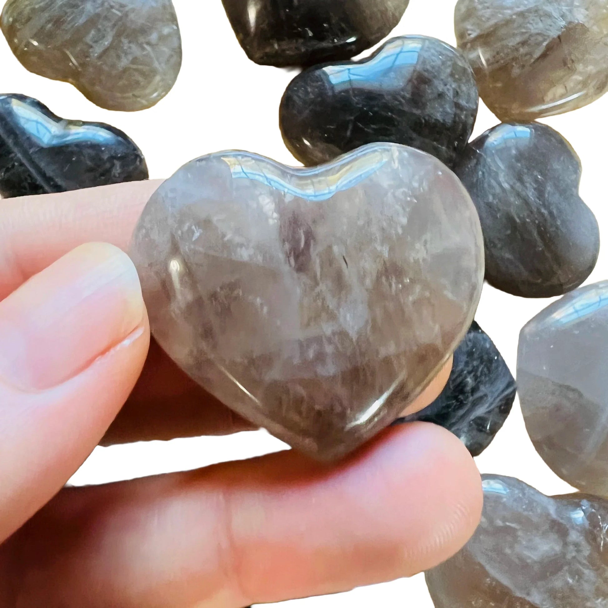Rear view of brown Smoky Quartz polished heart, from Vakinankaratra, Madagascar.
