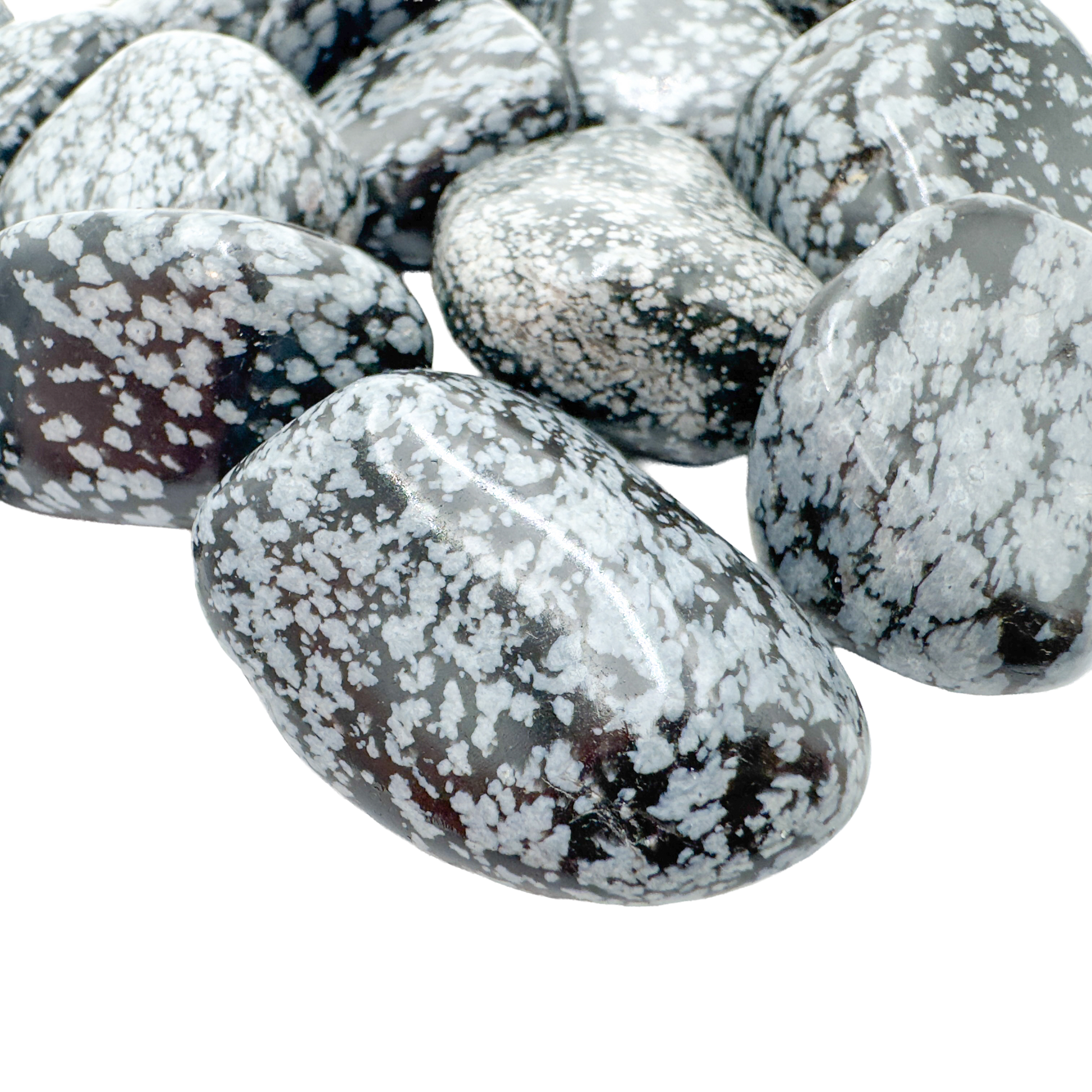 Snowflake Obsidian tumbled stone detail, cristobalite crystals formed as the volcanic glass cooled