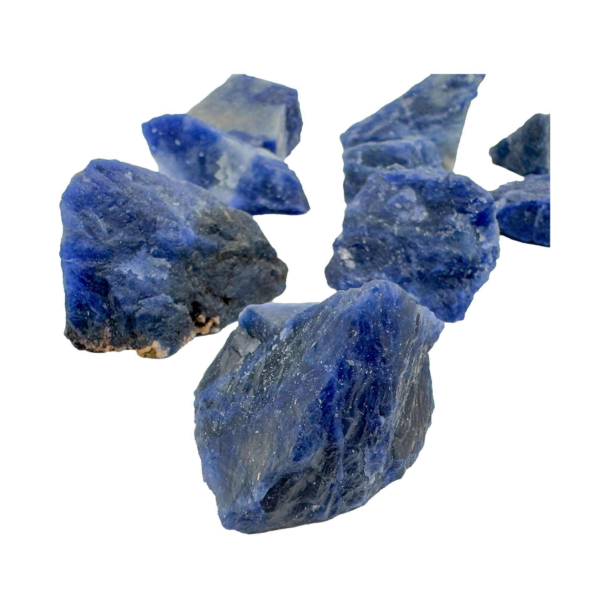 Close detail of Sodalite rough showing natural blue coloration and white inclusions, Grade AA