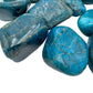 Side profile of Apatite tumbled stone, showing matte finish.