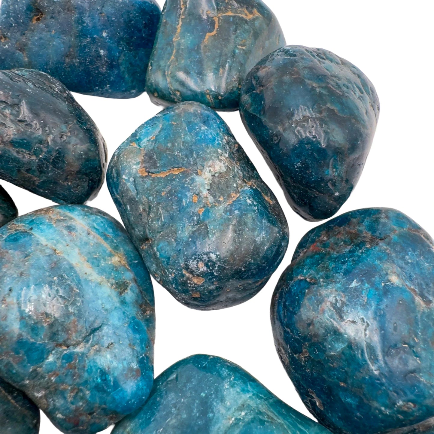 Hand-scale shot of a Apatite tumbled stone, sourced from Madagascar.