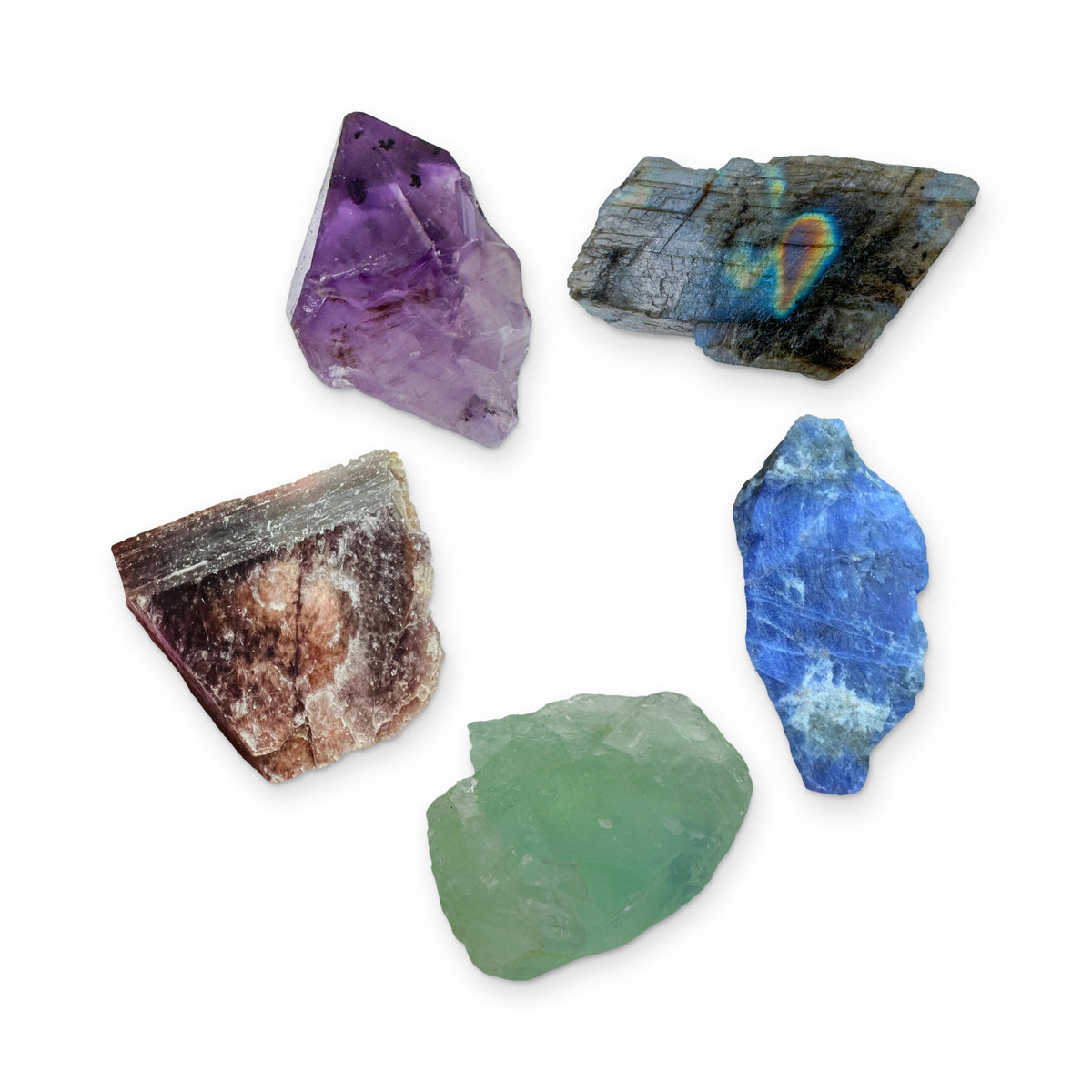 Third Eye Chakra Crystal Kit: amethyst point, labradorite, sodalite, fluorite and lepidolite, shown together on white