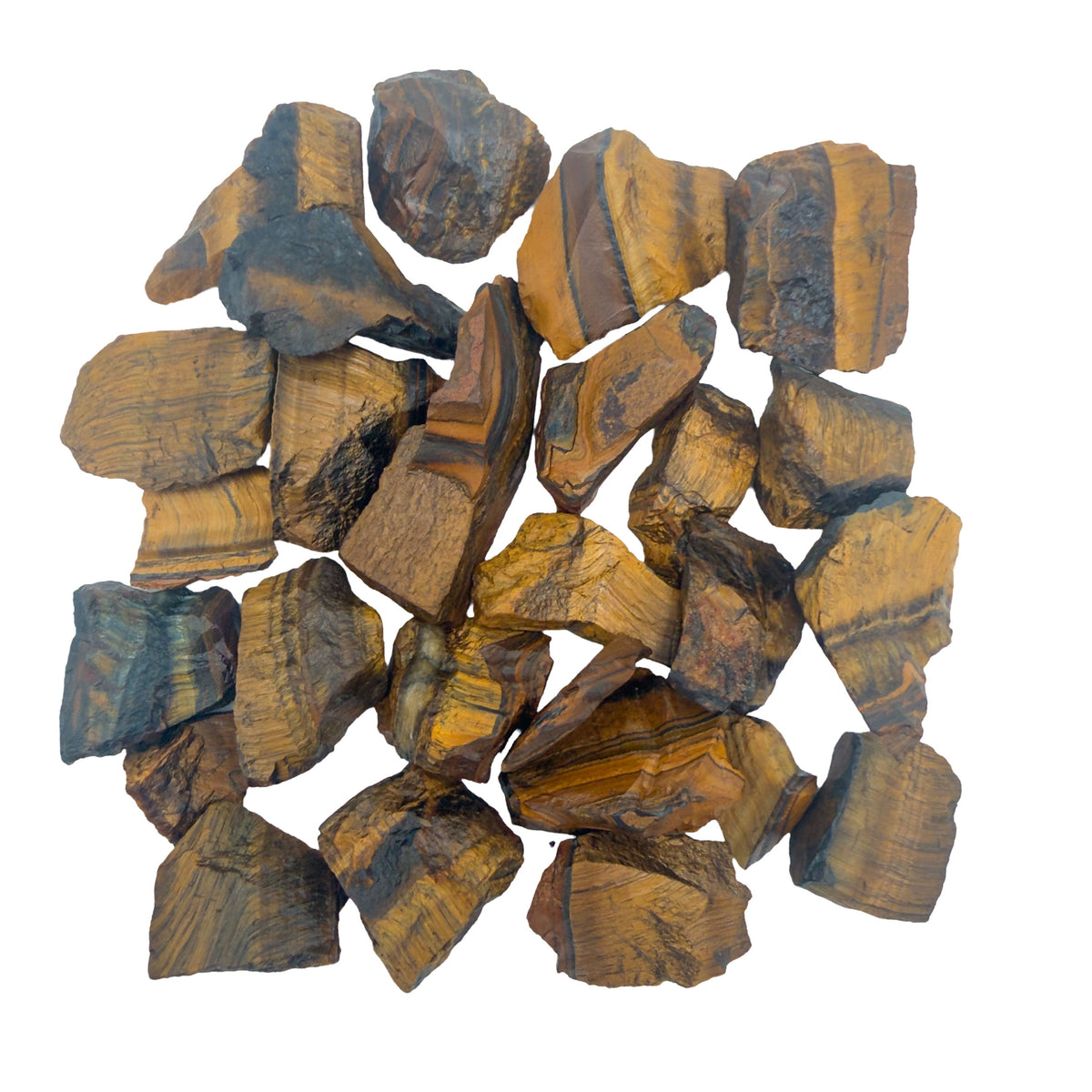 Assortment of small raw Tiger Eye pieces arranged loosely, showing how the gold chatoyant bands and darker crocidolite zones vary from stone to stone within one lot.