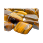 Detail of Grade A Tiger Eye tumbled stone showing chatoyant banding